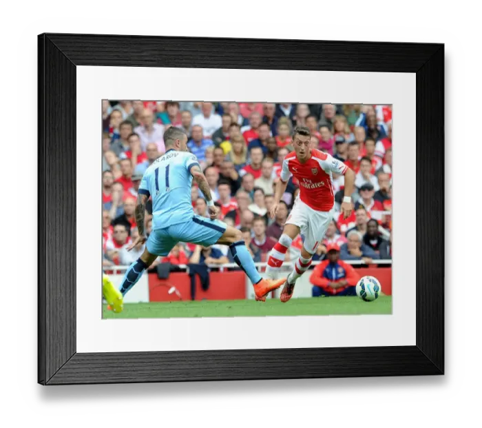 Framed Print : Mesut Ozil (Arsenal) Alexander Kolarov (Man City). Arsenal 2: 2 Manchester City. Barclays
