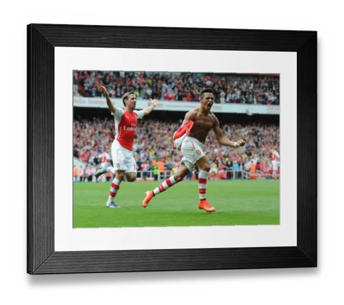 Framed Print : Alexis Sanchez's Double: Arsenal's Victory Moment Against Manchester City (2014-15) Framed Print : Alexis Sanchez's Double: Arsenal's Victory Moment Against Manchester City (2014-15)