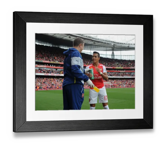 Framed Print : Alexis Sanchez (Arsenal) with Arsenal Physio Colin Lewin before the match. Arsenal 2
