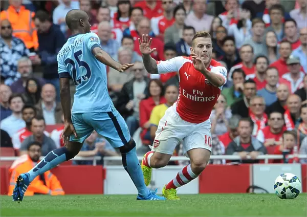 Jack Wilshere (Arsenal) Fernadinho (Man City). Arsenal 2: 2 Manchester City. Barclays Premier League