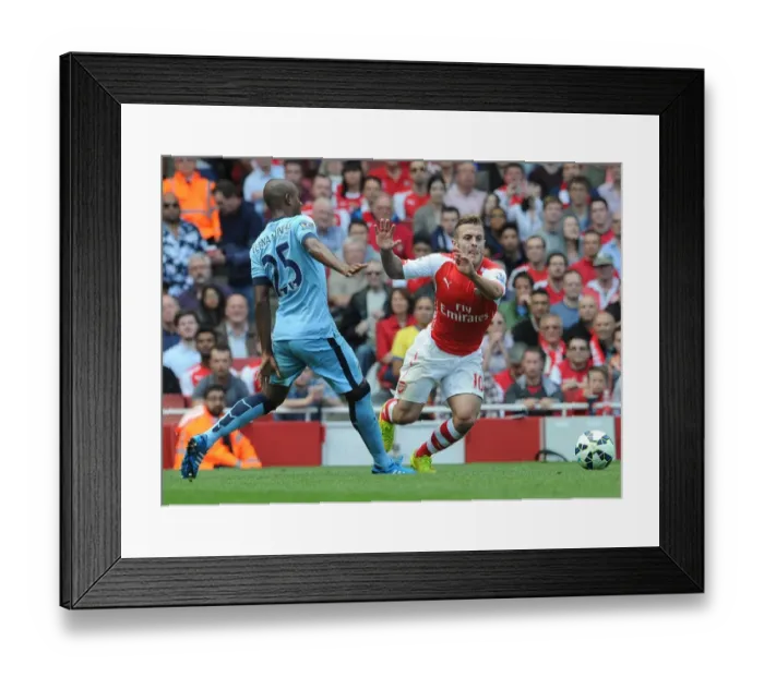 Framed Print : Jack Wilshere (Arsenal) Fernadinho (Man City). Arsenal 2: 2 Manchester City. Barclays Premier League Framed Print : Jack Wilshere (Arsenal) Fernadinho (Man City). Arsenal 2: 2 Manchester City. Barclays Premier League