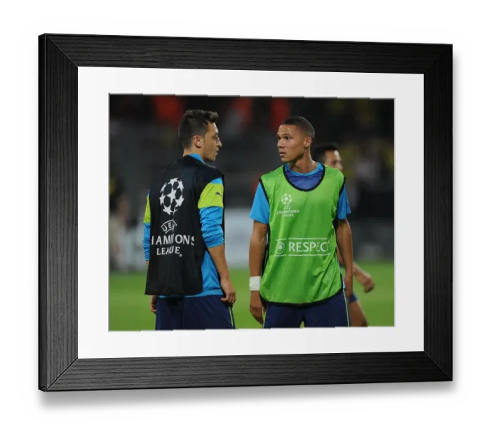 Framed Print : Arsenal's Gibbs and Ozil Prepare for Borussia Dortmund Clash in UEFA Champions League Framed Print : Arsenal's Gibbs and Ozil Prepare for Borussia Dortmund Clash in UEFA Champions League