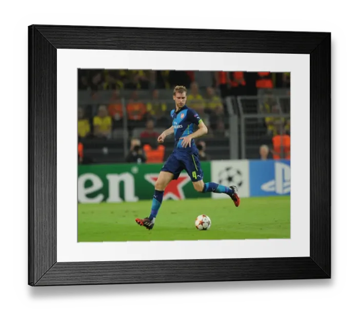 Framed Print : Per Mertesacker in Action: Borussia Dortmund vs. Arsenal, UEFA Champions League (2014-15)