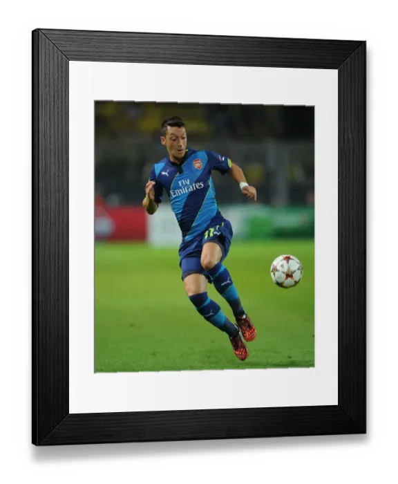 Framed Print : Mesut Ozil in Action: Borussia Dortmund vs. Arsenal, UEFA Champions League (2014-15)