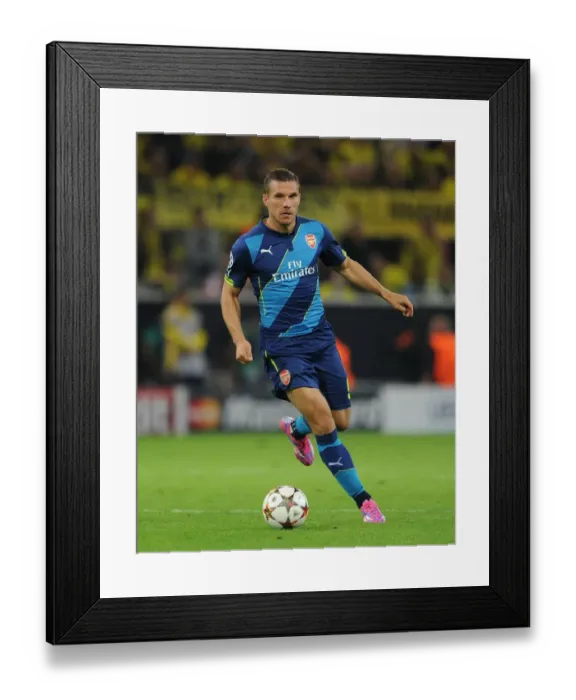 Framed Print : Lukas Podolski: Battle of the Borussias - Borussia Dortmund vs. Arsenal, UEFA Champions League, 2014