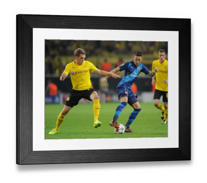 Framed Print : Clash of Titans: Ozil vs. Ginter - Borussia Dortmund vs. Arsenal, UEFA Champions League