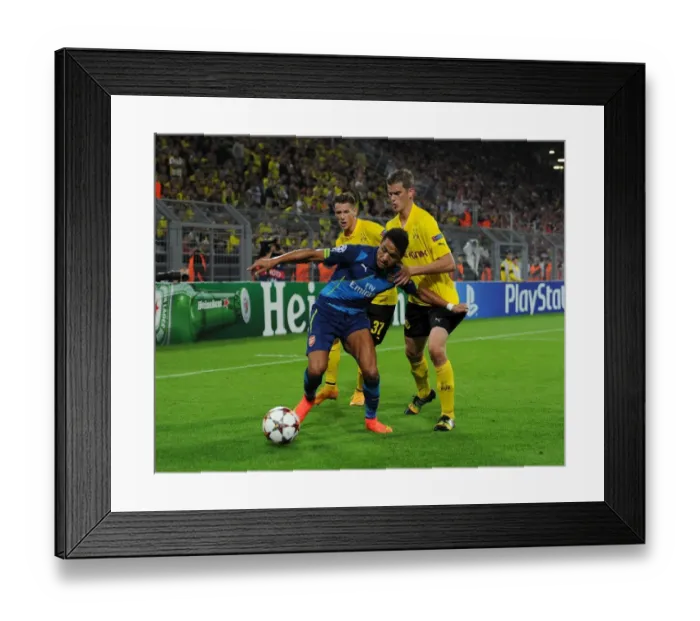 Framed Print : Clash of Titans: Sanchez vs. Dortmund's Defense - Borussia Dortmund vs. Arsenal, UEFA Champions League Framed Print : Clash of Titans: Sanchez vs. Dortmund's Defense - Borussia Dortmund vs. Arsenal, UEFA Champions League
