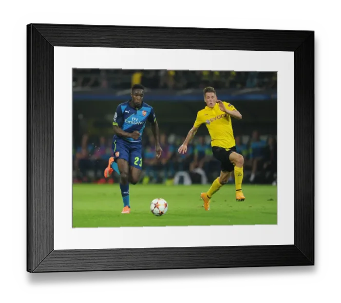Framed Print : Danny Welbeck vs. Eric Durm: A UEFA Champions League Battle Framed Print : Danny Welbeck vs. Eric Durm: A UEFA Champions League Battle