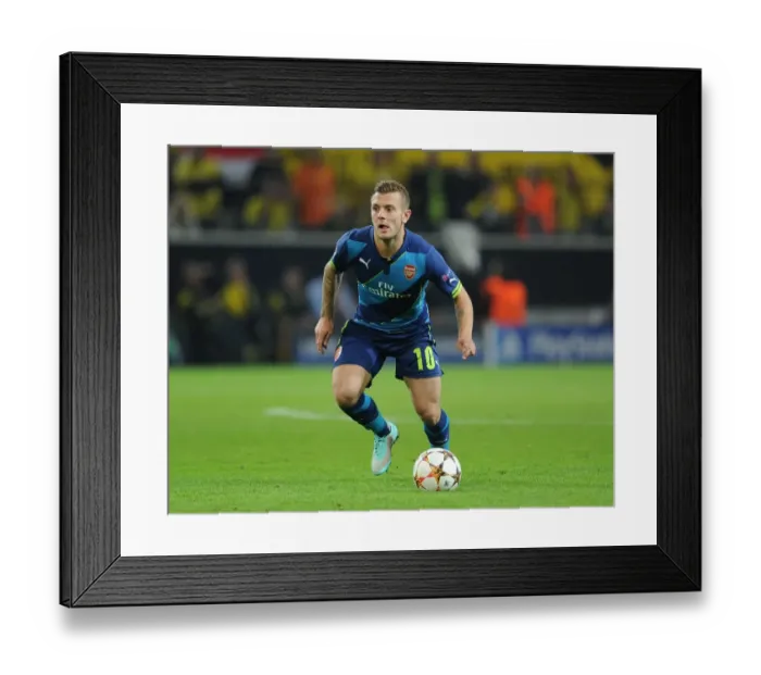 Framed Print : Jack Wilshere: In Action Against Borussia Dortmund in the 2014-15 UEFA Champions League Framed Print : Jack Wilshere: In Action Against Borussia Dortmund in the 2014-15 UEFA Champions League