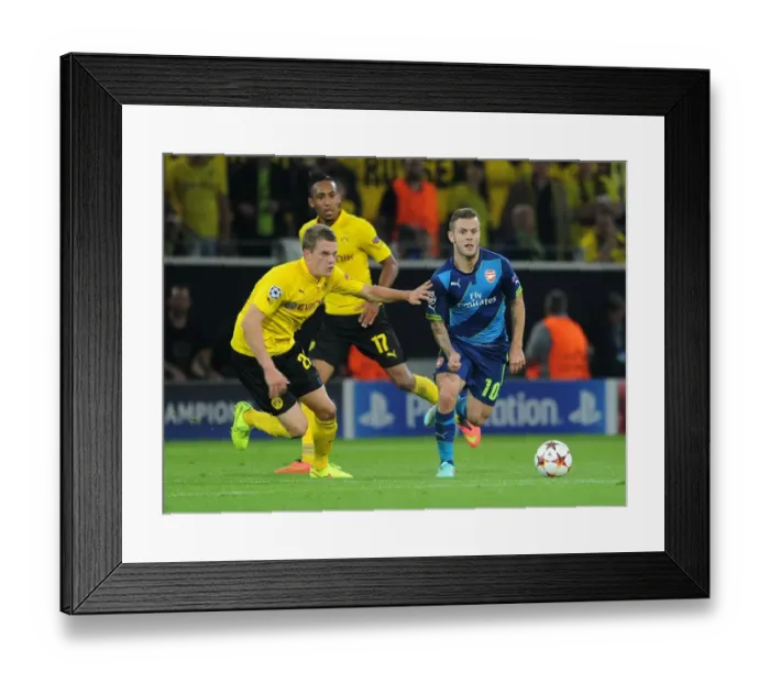 Framed Print : Clash of Midfield Titans: Wilshere vs. Ginter in Borussia Dortmund vs. Arsenal, UEFA Champions League Framed Print : Clash of Midfield Titans: Wilshere vs. Ginter in Borussia Dortmund vs. Arsenal, UEFA Champions League