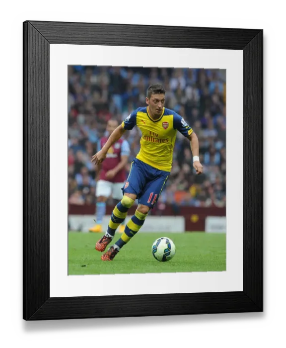 Framed Print : Mesut Ozil in Action: Aston Villa vs. Arsenal, Premier League 2014-15