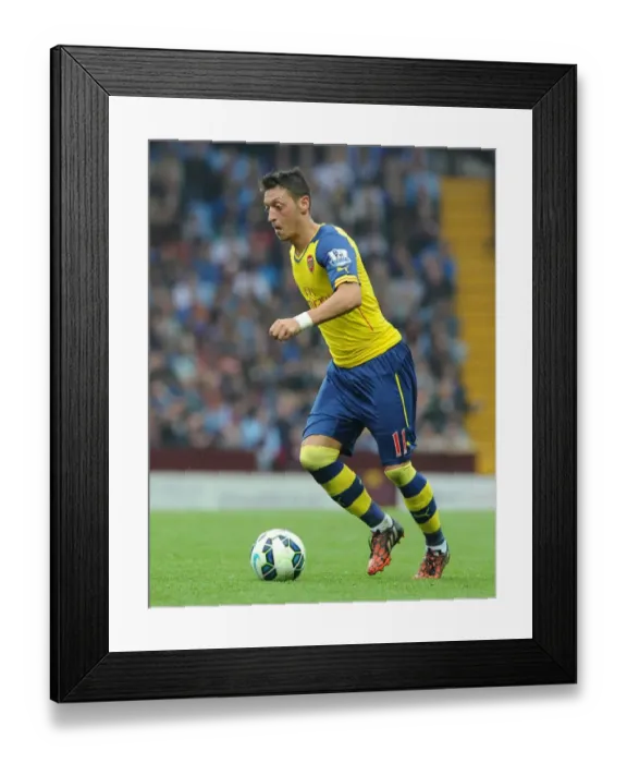 Framed Print : Mesut Ozil in Action: Arsenal vs. Aston Villa, Premier League 2014-15