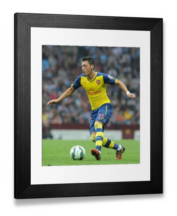 Framed Print : Mesut Ozil in Action: Arsenal vs. Aston Villa, Premier League 2014-15 Framed Print : Mesut Ozil in Action: Arsenal vs. Aston Villa, Premier League 2014-15