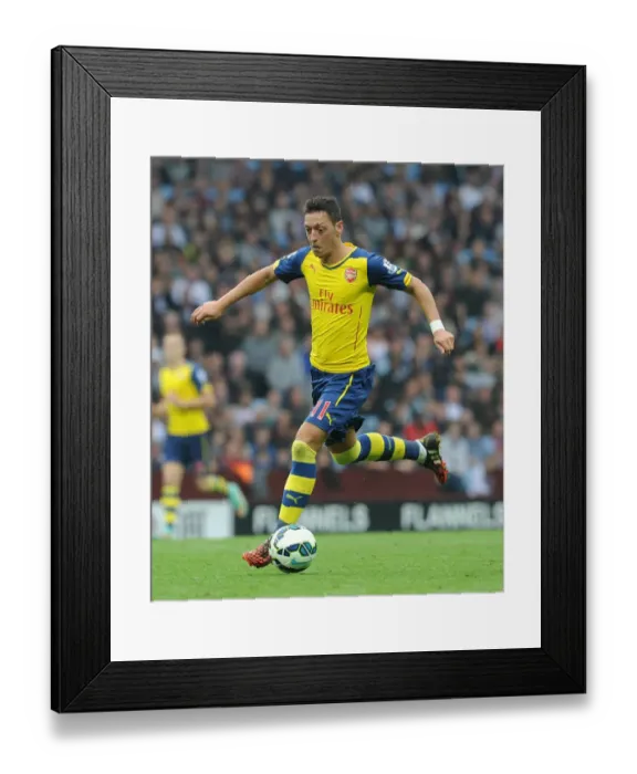 Framed Print : Mesut Ozil in Action: Arsenal vs. Aston Villa, Premier League 2014-15