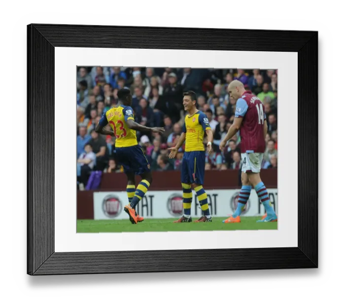 Framed Print : Mesut Ozil and Danny Welbeck Celebrate Arsenal's First Goal Against Aston Villa (2014-15) Framed Print : Mesut Ozil and Danny Welbeck Celebrate Arsenal's First Goal Against Aston Villa (2014-15)