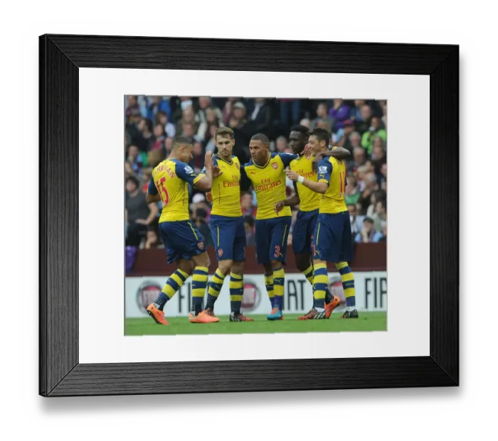 Framed Print : Mesut Ozil and Team Celebrate First Goal Against Aston Villa (2014-15)