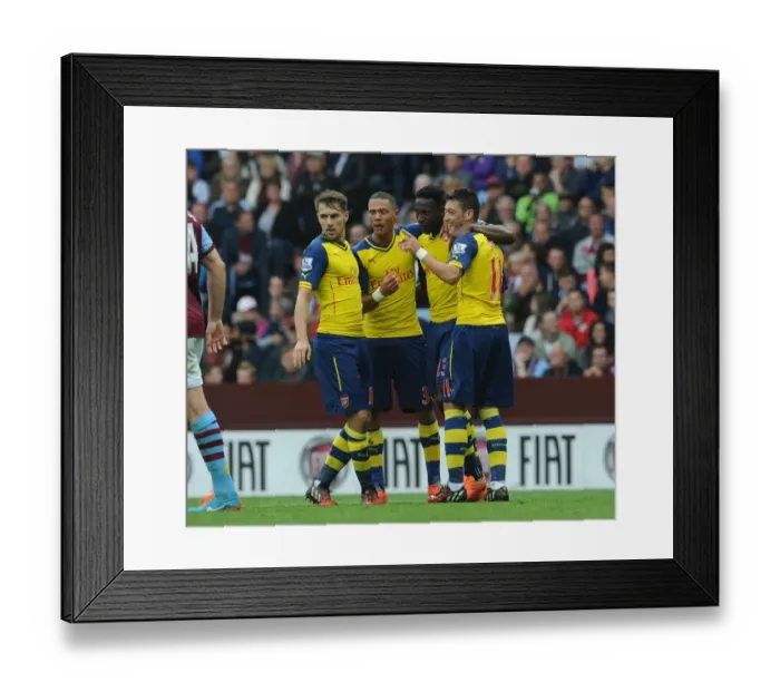 Framed Print : Mesut Ozil's Strike: Arsenal's Winning Moment vs. Aston Villa (2014-15) Framed Print : Mesut Ozil's Strike: Arsenal's Winning Moment vs. Aston Villa (2014-15)