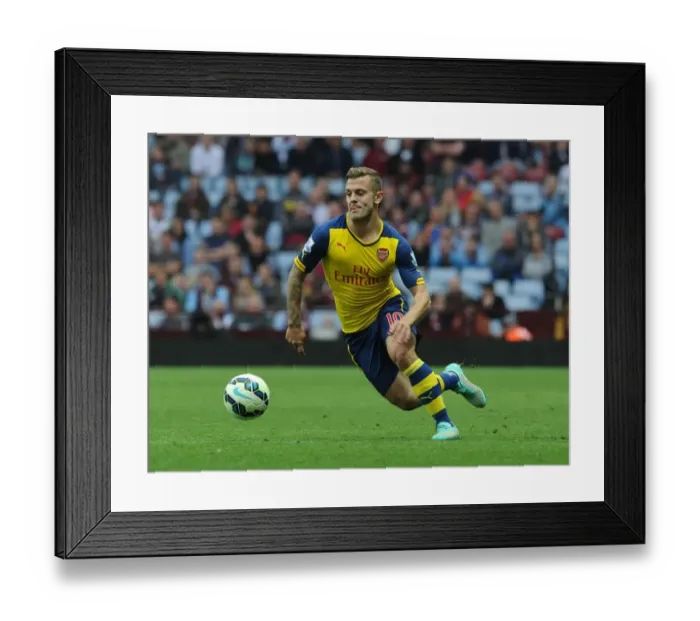 Framed Print : Jack Wilshere Focuses on Arsenal's Victory Against Aston Villa (September 2014)