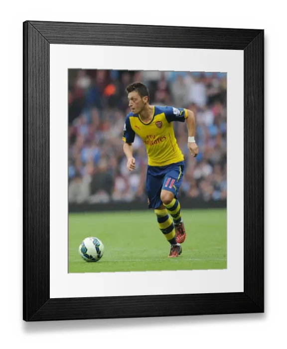 Framed Print : Mesut Ozil in Action: Arsenal vs. Aston Villa, Premier League 2014-15 Framed Print : Mesut Ozil in Action: Arsenal vs. Aston Villa, Premier League 2014-15