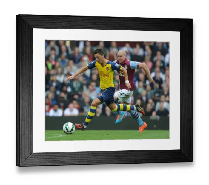 Framed Print : Mesut Ozil Scores First Arsenal Goal: Outmaneuvering Senderos at Aston Villa, Premier League 2014-15 Framed Print : Mesut Ozil Scores First Arsenal Goal: Outmaneuvering Senderos at Aston Villa, Premier League 2014-15