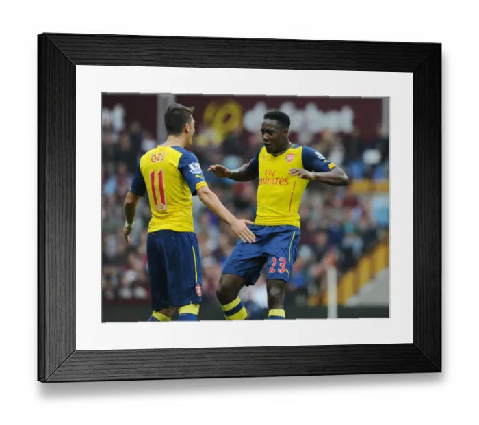 Framed Print : Mesut Ozil and Danny Welbeck Celebrate First Goal: Aston Villa vs. Arsenal, 2014-15 Premier League Framed Print : Mesut Ozil and Danny Welbeck Celebrate First Goal: Aston Villa vs. Arsenal, 2014-15 Premier League