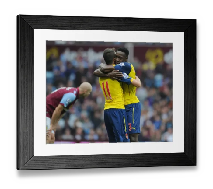 Framed Print : Mesut Ozil and Dany Welbeck Celebrate Arsenal's First Goal vs. Aston Villa (2014-15) Framed Print : Mesut Ozil and Dany Welbeck Celebrate Arsenal's First Goal vs. Aston Villa (2014-15)