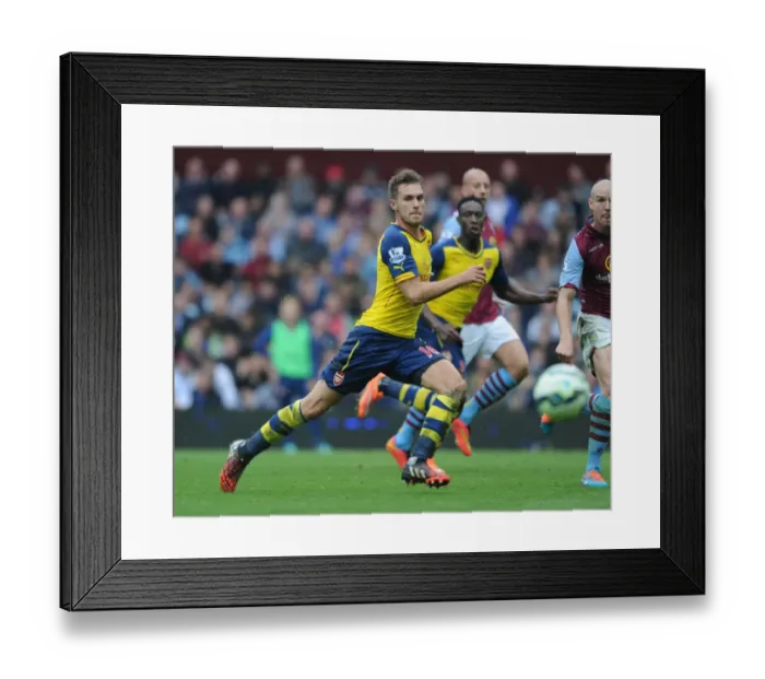 Framed Print : Aaron Ramsey in Action: Aston Villa vs Arsenal, Premier League 2014-15 Framed Print : Aaron Ramsey in Action: Aston Villa vs Arsenal, Premier League 2014-15
