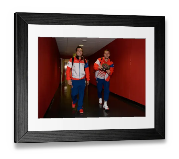 Framed Print : Arsenal FC: Santi Cazorla and Lukas Podolski Arrive at Emirates Stadium for Arsenal v Southampton, League Cup 2014 / 15 Framed Print : Arsenal FC: Santi Cazorla and Lukas Podolski Arrive at Emirates Stadium for Arsenal v Southampton, League Cup 2014 / 15