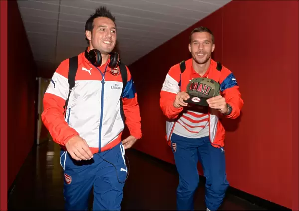 Arsenal Football Club: Santi Cazorla and Lukas Podolski Arrive before Arsenal v Southampton, League Cup 2014 / 15