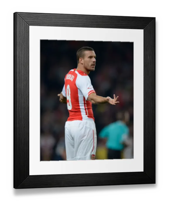 Framed Print : Arsenal's Lukas Podolski in Action against Southampton in the League Cup Framed Print : Arsenal's Lukas Podolski in Action against Southampton in the League Cup