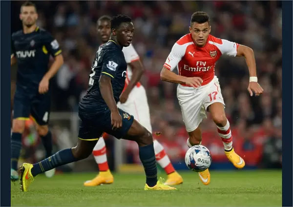 Sanchez vs. Wanyama: A Footballing Showdown at the Emirates - Arsenal vs. Southampton, League Cup 2014 / 15