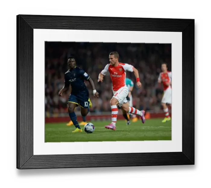 Framed Print : Arsenal vs Southampton: Capital One Cup Battle at Emirates Stadium