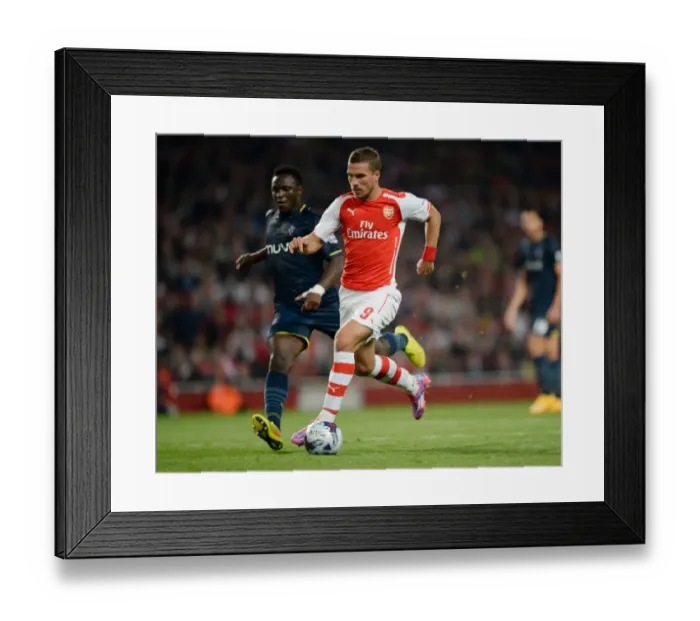Framed Print : Arsenal vs Southampton: Capital One Cup Battle at Emirates Stadium Framed Print : Arsenal vs Southampton: Capital One Cup Battle at Emirates Stadium