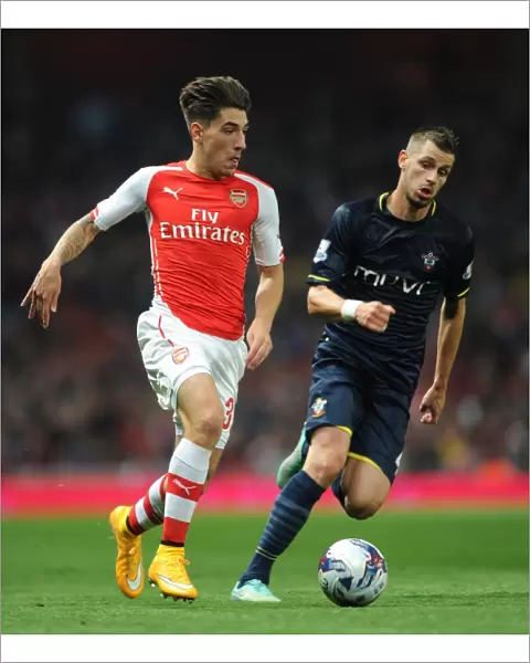 Arsenal's Hector Bellerin Faces Off Against Southampton's Morgan Schneiderlin in League Cup Clash
