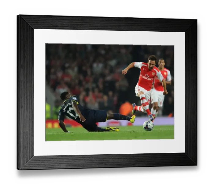 Framed Print : Santi Cazorla Outmaneuvers Victor Wanyama: Arsenal vs Southampton, League Cup 2014 / 15