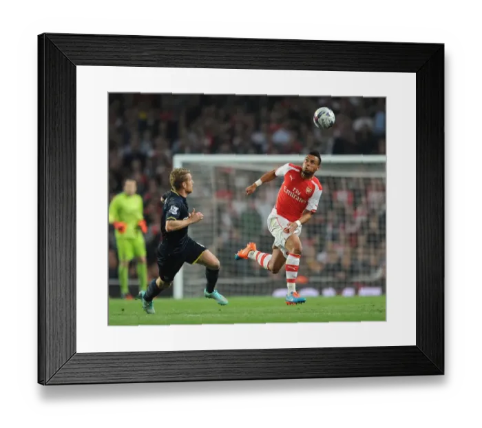 Framed Print : Arsenal's Coquelin Clashes with Southampton's Davis in League Cup Showdown