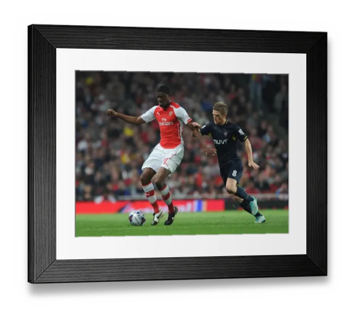 Framed Print : Abou Diaby vs. Steven Davis: Battle in the Capital One Cup between Arsenal and Southampton Framed Print : Abou Diaby vs. Steven Davis: Battle in the Capital One Cup between Arsenal and Southampton