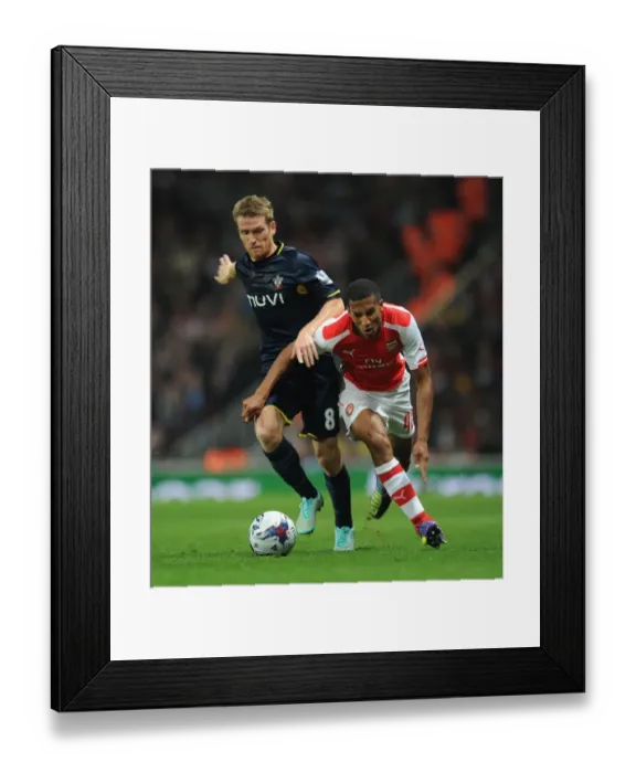 Framed Print : Hayden vs. Davis: A Tense Battle - Arsenal vs. Southampton (League Cup 2014 / 15)