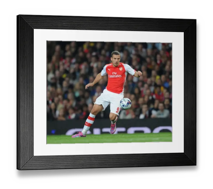 Framed Print : Lukas Podolski in Action: Arsenal vs Southampton, League Cup 2014 / 15