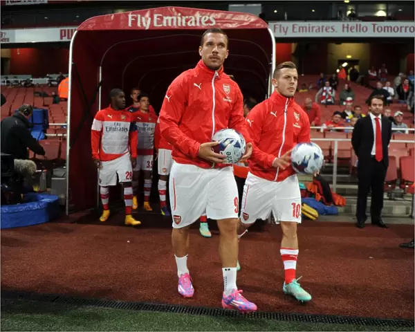 Arsenal's Podolski and Wilshere Prepare for Arsenal v Southampton in League Cup Showdown