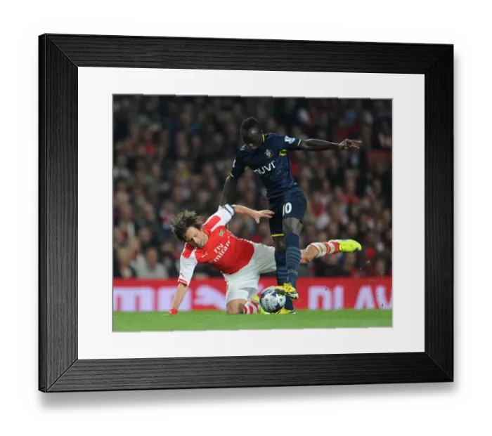 Framed Print : Arsenal's Rosicky Faces Off Against Southampton's Mane in League Cup Clash Framed Print : Arsenal's Rosicky Faces Off Against Southampton's Mane in League Cup Clash