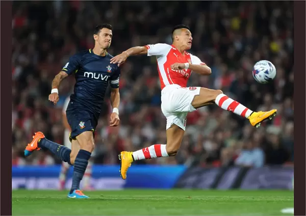 Arsenal's Alexis Sanchez Faces Off Against Southampton's Jose Fonte in League Cup Clash