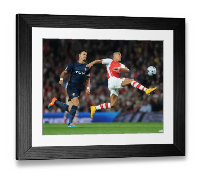 Framed Print : Arsenal's Alexis Sanchez Faces Off Against Southampton's Jose Fonte in League Cup Clash