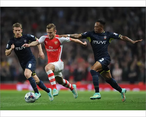 Arsenal's Jack Wilshere Clashes with Southampton's Davis and Clyne in League Cup Showdown