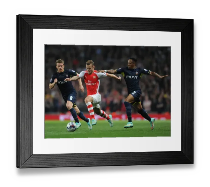 Framed Print : Arsenal's Jack Wilshere Clashes with Southampton's Davis and Clyne in League Cup Showdown Framed Print : Arsenal's Jack Wilshere Clashes with Southampton's Davis and Clyne in League Cup Showdown