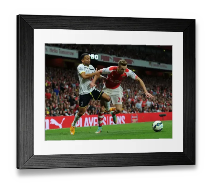 Framed Print : Intense Rivalry: Chambers vs. Lennon - Arsenal vs. Tottenham Clash