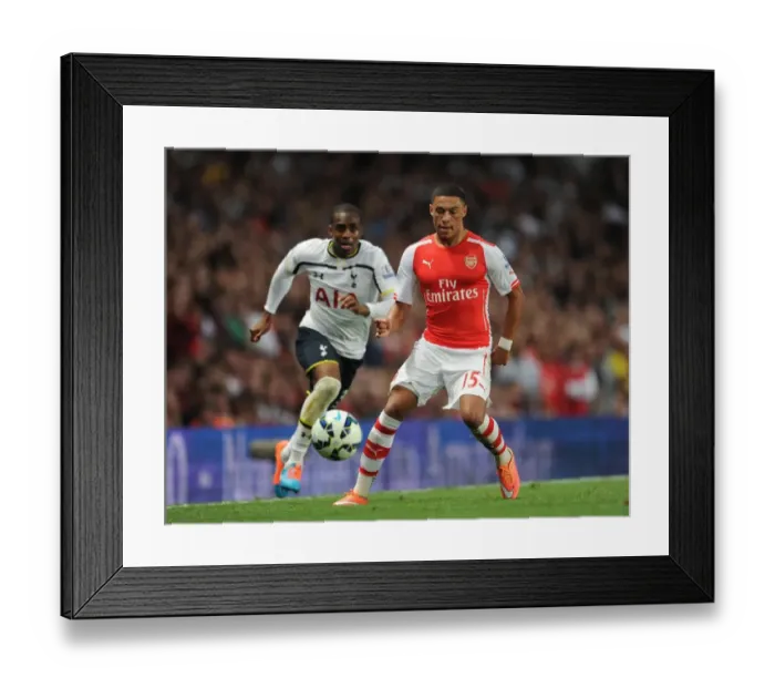 Framed Print : Clash of Rivals: Oxlade-Chamberlain vs. Rose in the Intense Arsenal vs. Tottenham Rivalry (Barclays Premier League) Framed Print : Clash of Rivals: Oxlade-Chamberlain vs. Rose in the Intense Arsenal vs. Tottenham Rivalry (Barclays Premier League)