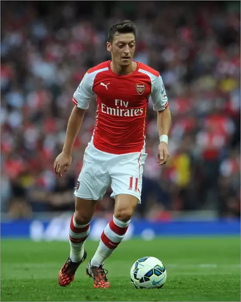 Mesut Ozil in Action: Arsenal vs. Tottenham Rivalry, 2014