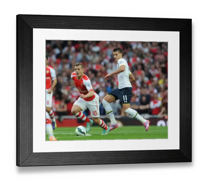 Framed Print : Arsenal's Jack Wilshere Clashes with Tottenham's Erik Lamela in Premier League Showdown Framed Print : Arsenal's Jack Wilshere Clashes with Tottenham's Erik Lamela in Premier League Showdown
