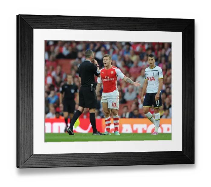 Framed Print : Arsenal vs. Tottenham: Wilshere and the Ref during the Intense 2014-15 Premier League Clash Framed Print : Arsenal vs. Tottenham: Wilshere and the Ref during the Intense 2014-15 Premier League Clash